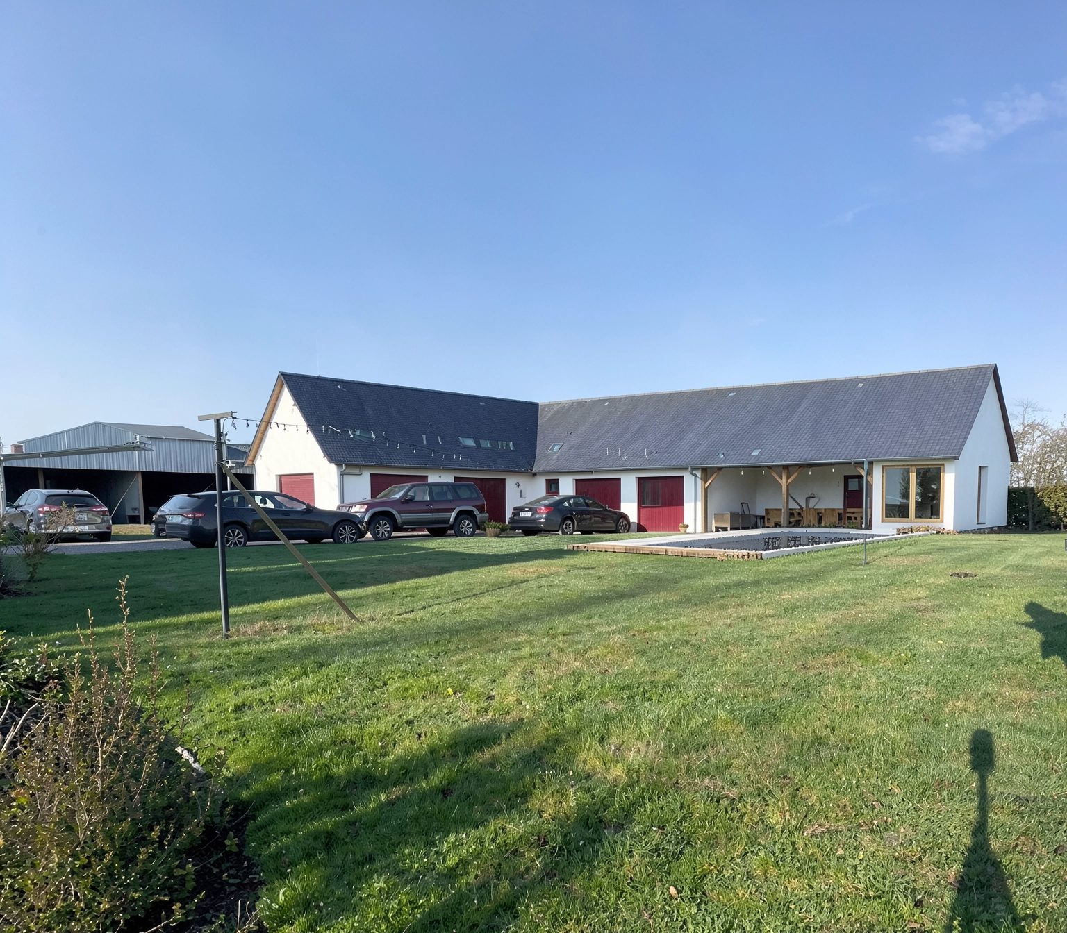 Extension avec terrasse couverte et piscine à Mesnils-sur-Iton